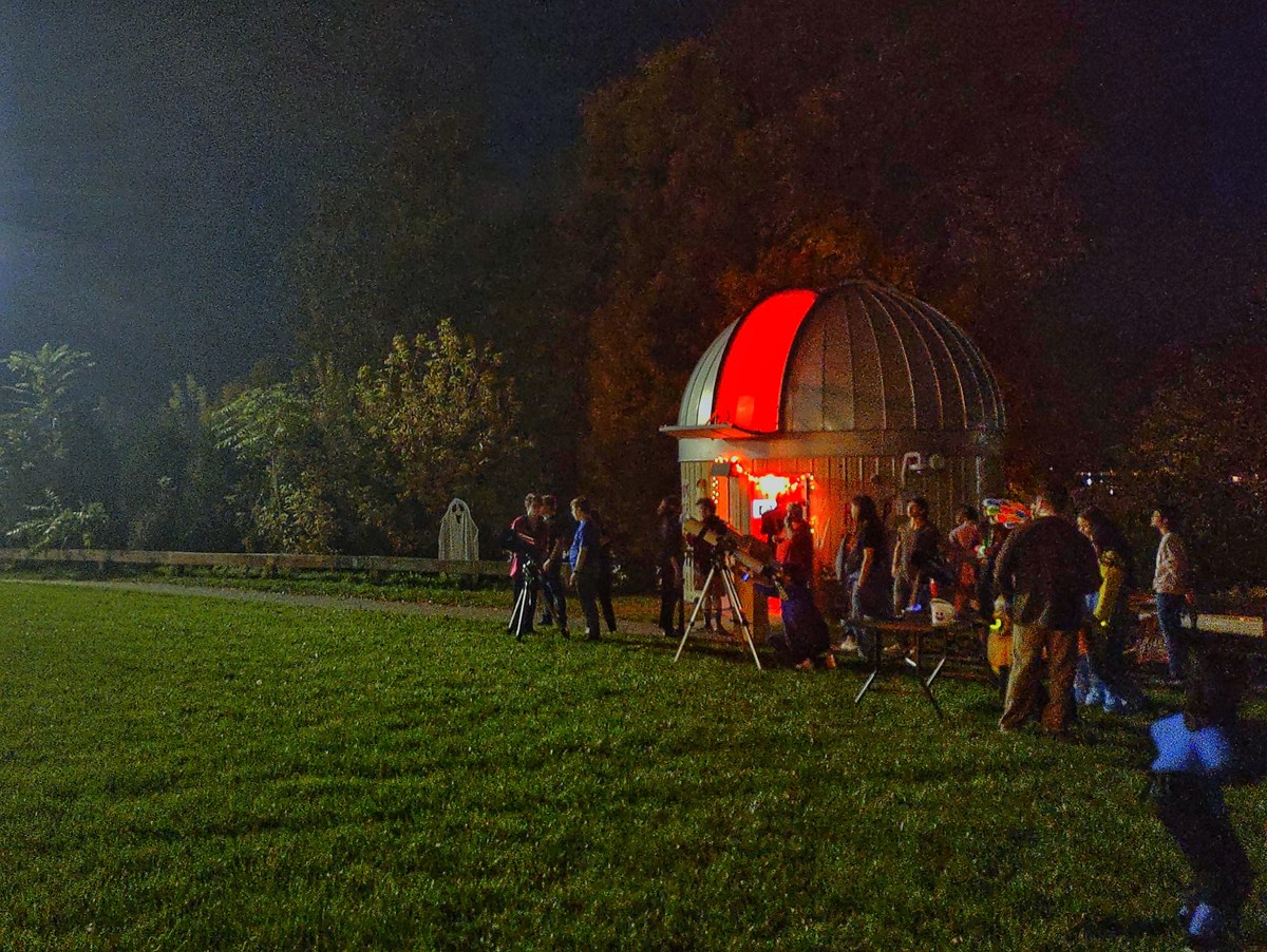 Students enjoying the Halloween-themed event at Schueller Observatory “spooky viewing party”.