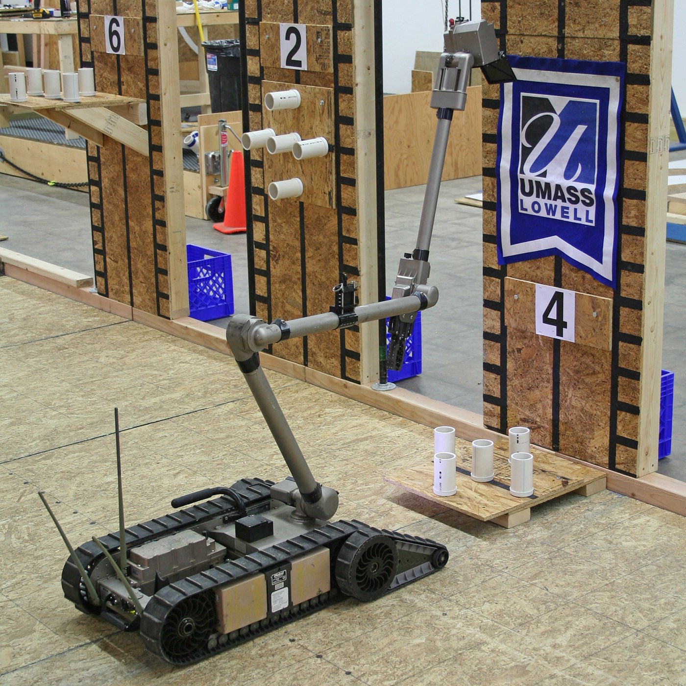 Endeavor Packbot response robot system inspecting a dexterity artifact.