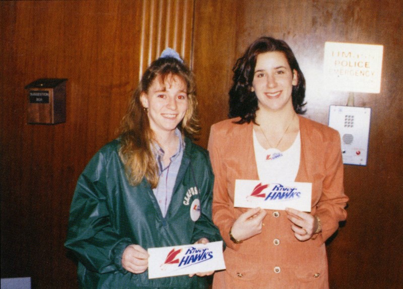 Two female students with River Hawks stickers in 1994