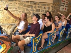 Students take a selfie on a small roller coaster on the top of Monte Igueldo in San Sebastián, Spain