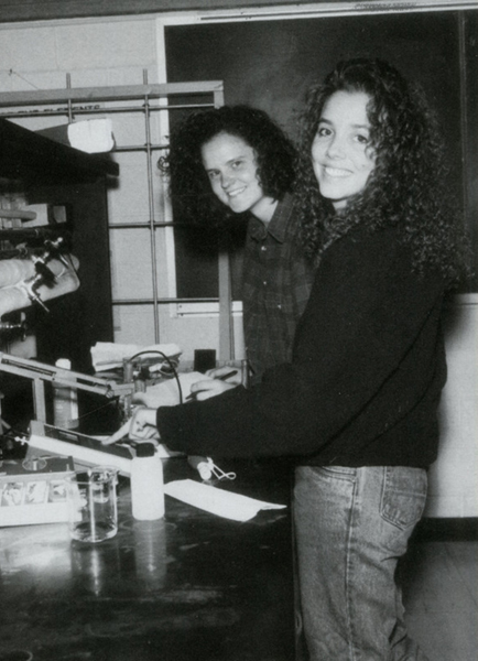 Two female students work together in a lab in 1995.