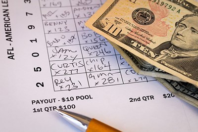 Betting sheet and money 