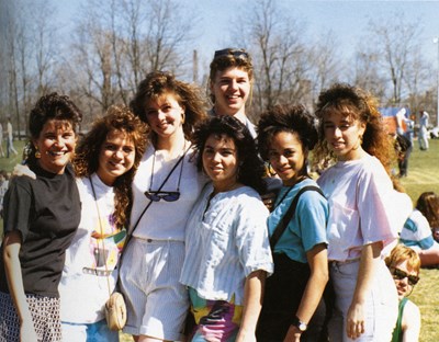 1989 female students and male student at spring carnival