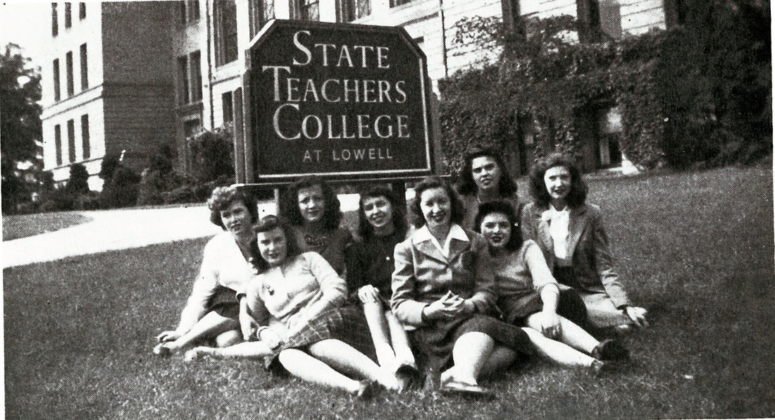 Female students pose for a photo in front of the State Teachers College at Lowell sign in 1946
