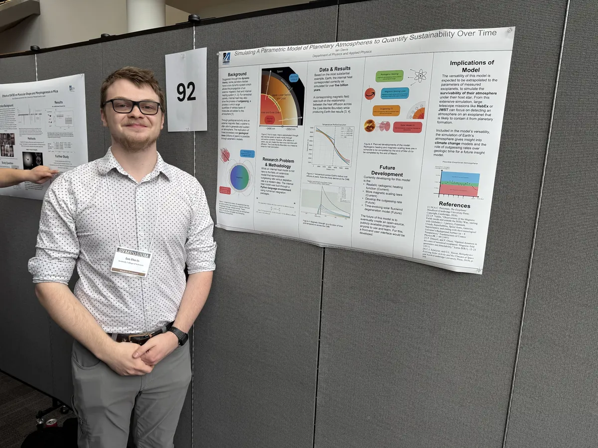 Ian Davis presents his poster: "Simulating A Parametric Model of Planetary Atmospheres to Quantify Sustainability Over Time".