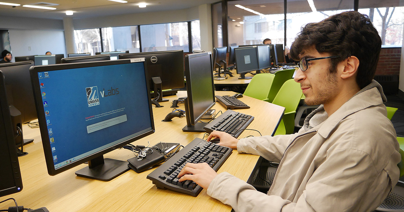 A student using vLabs on a computer at the O'Leary Library.