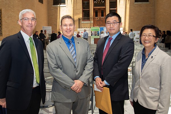 Tim Cunniff of Little Leaf Farms with UMass Lowell Provost Michael Vayda, Asst. Prof. Boce Zhang and Vice Chancellor of Research Julie Chen in at State House 