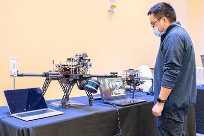 Qu Liu, a UMass Lowell doctoral student in computer science, overlooks research to develop new technology for drones 