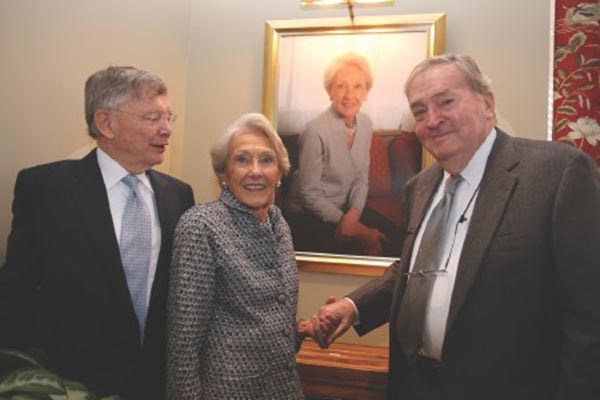 Enterprise Bank Chairman George Duncan, left, Nancy Donahue, and her now-late husband Richard Donahue.