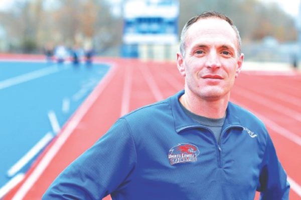 UMass Lowell cross country and track & field coach Gary Gardner has earned any number of Coach of the Year awards in his 14 seasons in charge of both the men's and women's programs. SUN/JOHN LOVE