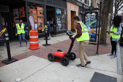 Student uses ground penetrating radar to text thickness of concrete in downtown Lowell