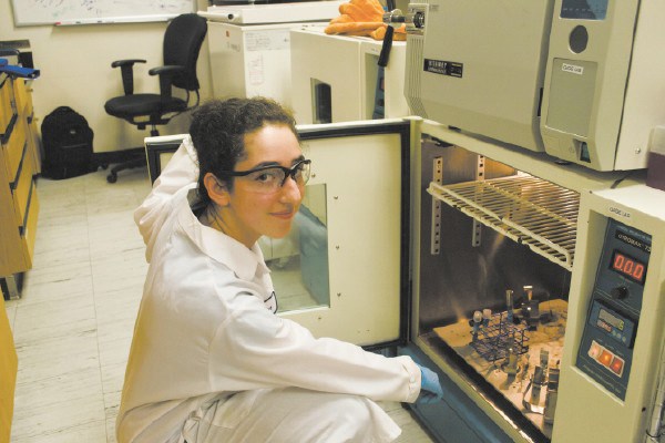 Sophia Manukian in a UMass Lowell chemistry lab.