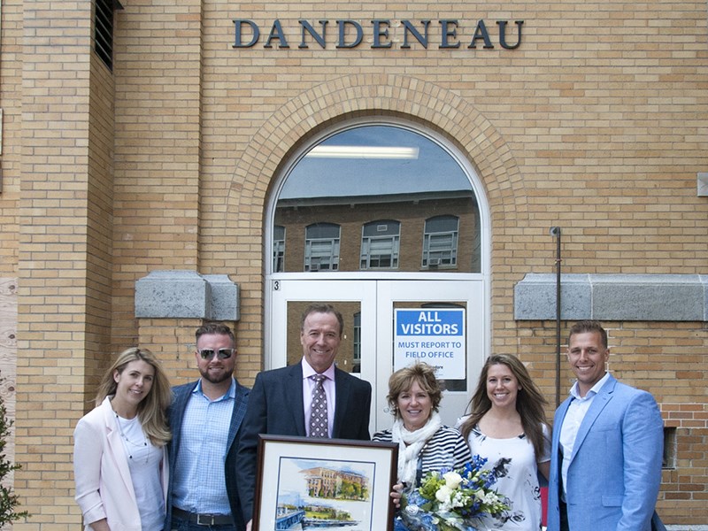 The Dandeneau family in front of their newly opened building