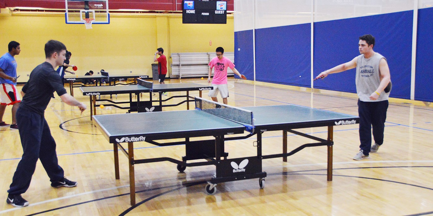 Students playing table tennis