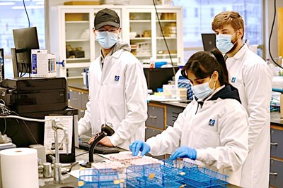 Lab workers check in new covid samples in the test lab