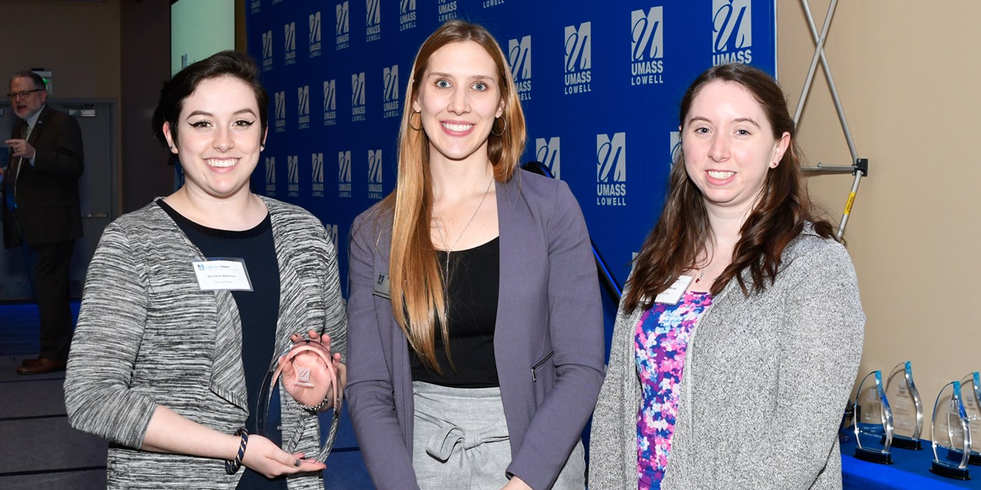 CAT Mat team members Michelle Mailloux and Katherine Muise pose with Holly Butler and their Honorable Mention award