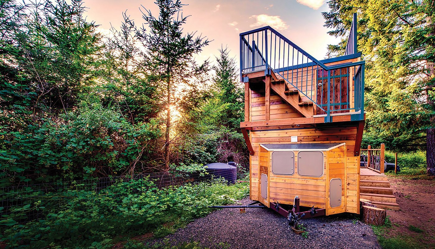 Tiny house designed and lived in by two alums