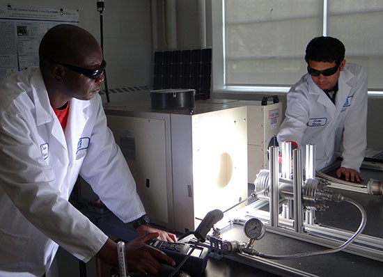 two-male-students-lab-coats-solar-energy-research-550-opt.jpg