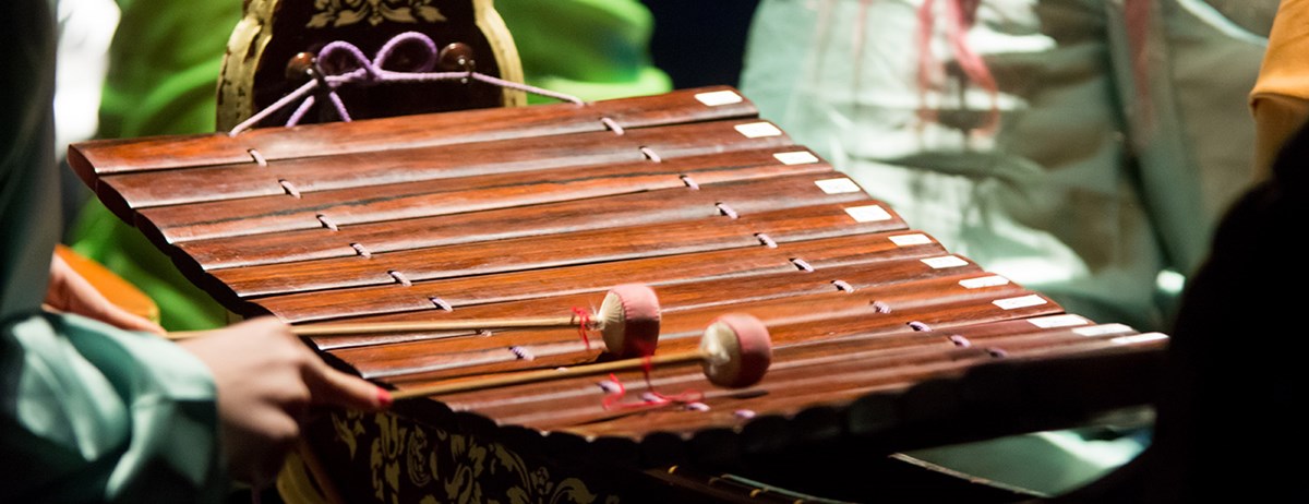 A musician plays a xylophone during a performance by the UMass Lowell World Music Ensemble at Celebrate Cambodian Arts, a festival honoring Cambodian cultural heritage.