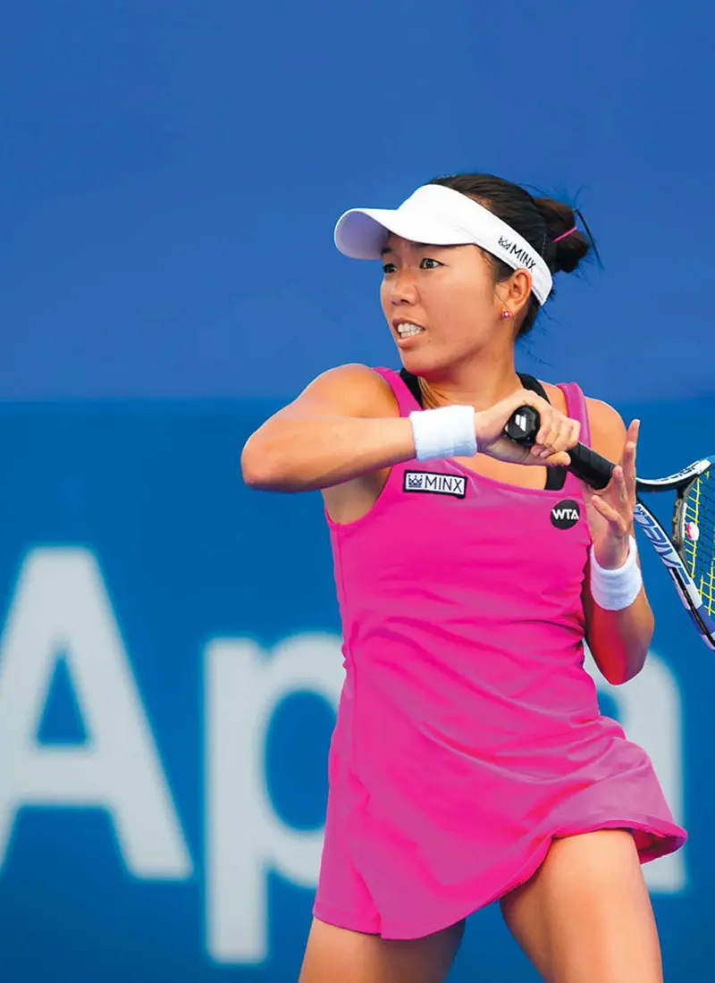 Vania King playing tennis