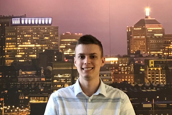 Sam Kovaly, a senior computer science major, pictured at his co-op at Veoneer in Lowell