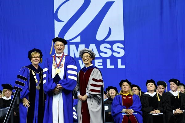 Chancellor Jacqueline Moloney, left, and Interim Provost Julie Chen present a Doctorate of Human Letters to Jack Wilson, looking on are Trustee Mary L. Burns '84 and Therese and Jack O'Connor, Chancellor's Medal for Public Service and Civic Engagement honorees.
