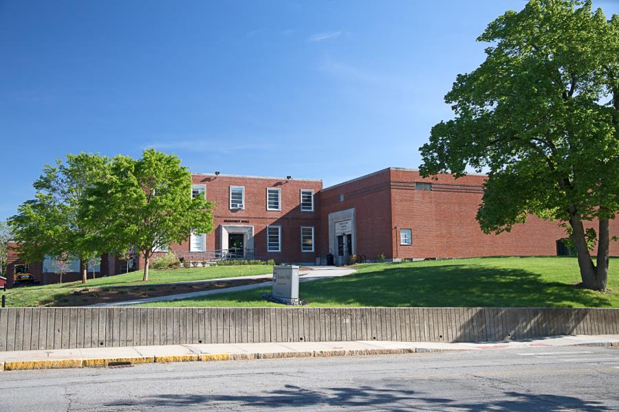 Two-story, flat-roofed red brick building