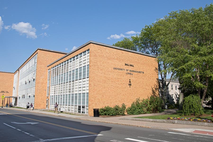 Yellow brick Ball Hall shot from corner of University Ave