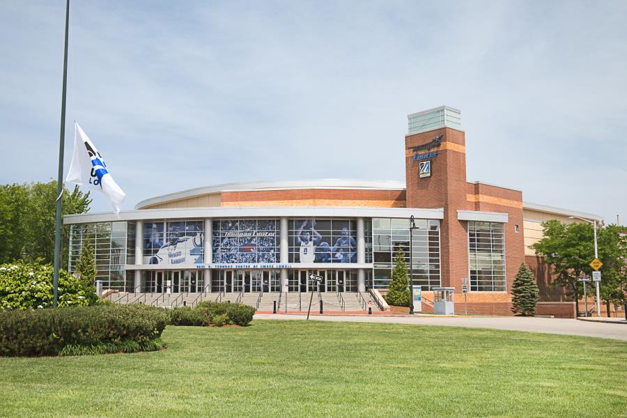 Front of Tsongas Center showing grass rotunda and wrapping stairs